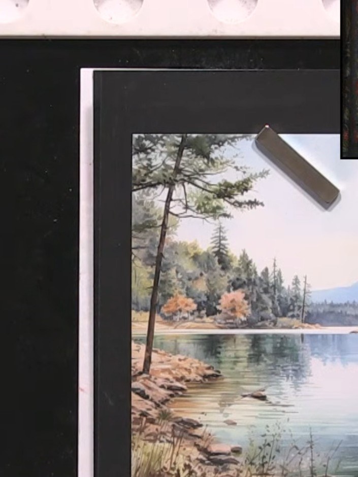Step 3: Stamp the design onto the patterned paper at the bottom of the image to create a light shadow effect below the