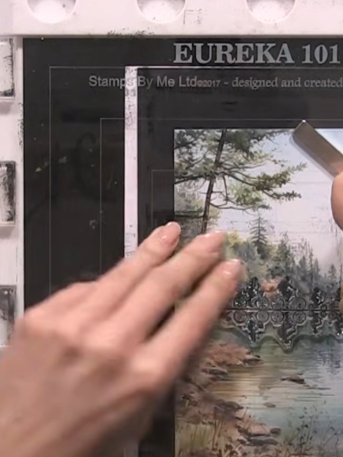 Step 5: Stamp the design again in exactly the same position to darken the top portion and create the reflection effect