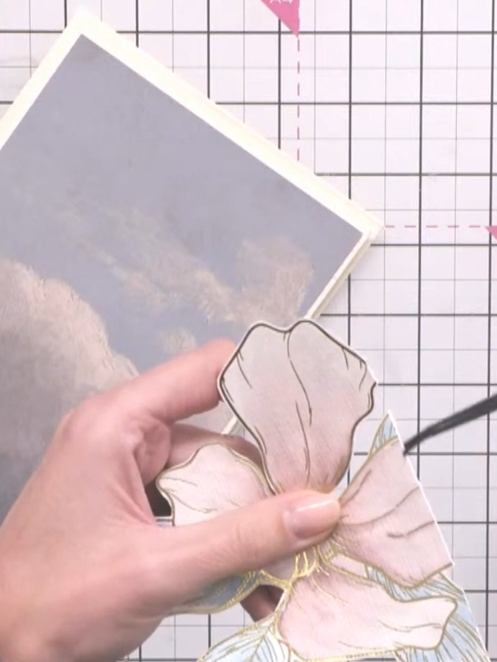 Step 10: Mount the coloured flower onto a cream matted layer using adhesive. Layer this onto your coordinating backgrou
