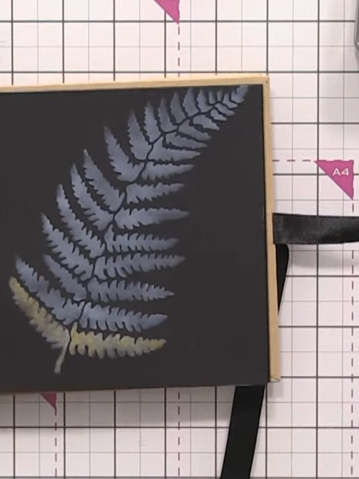Step 4: Continue adding sparkly confetti ink to other areas of the fern using different colours such as clear sparkle.