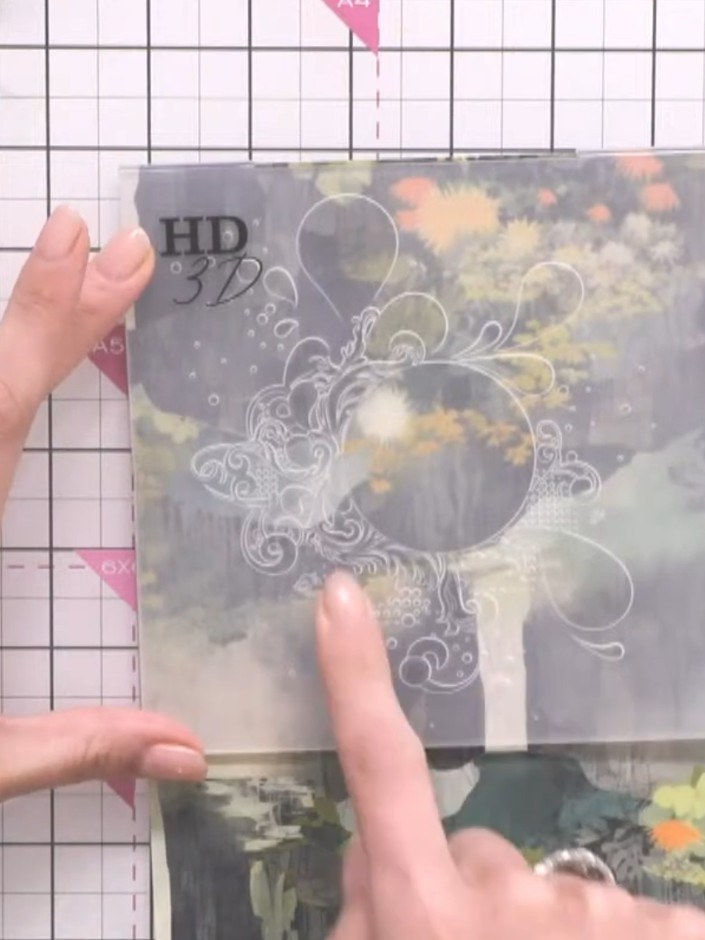 Step 2: Trim the embossed paper to a suitable size for your card base using a trimmer or scissors.