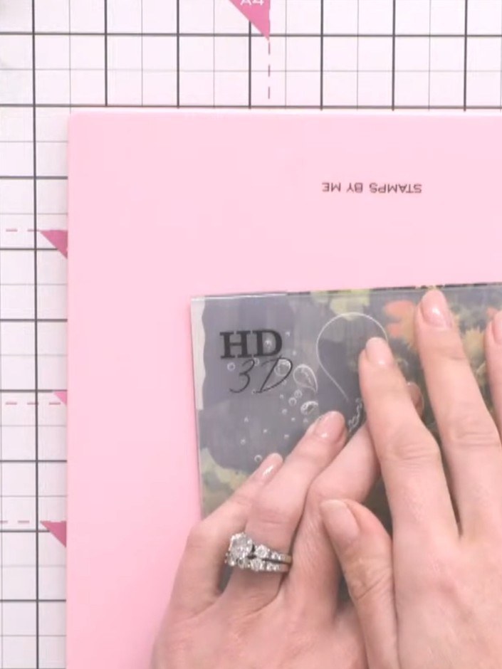 Step 7: Mount the embossed pink paper panel onto your pink card base to complete your grunge splash embossed backgroun