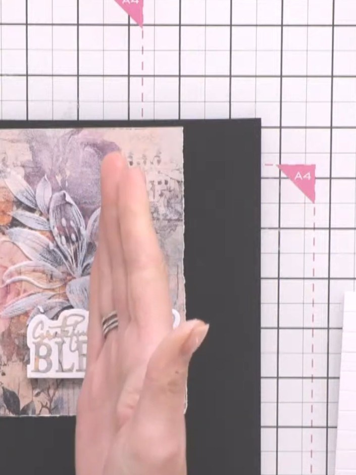 Step 1: Prepare a piece of white card stock as your base. Mount a decorative panel featuring the dotted tulips design 