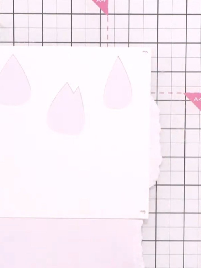 Step 5: Position the stencil over your card base and apply your second colour through the stencil, ensuring each layer