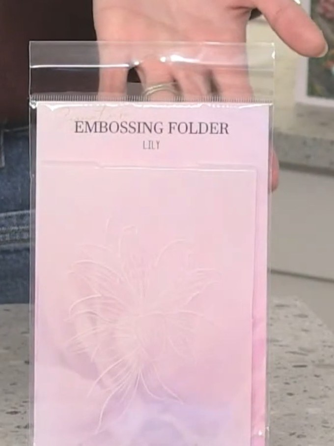 Step 2: Select your patterned paper from the Timeless paper pad and trim it to a suitable size for your card base.