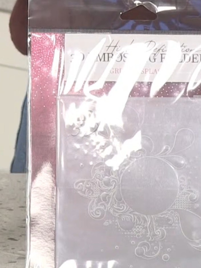 Step 3: Place the watercolour paper into the Lily embossing folder, ensuring it is positioned correctly within the fol