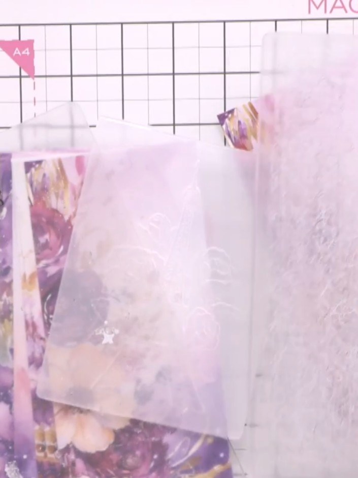 Step 3: Remove the embossed paper from the folder and examine the raised floral texture created by the embossing proce