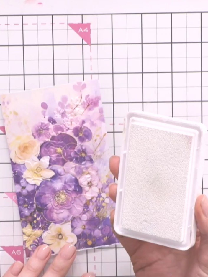 Step 7: Step back and admire the dimensional effect created by the embossing and white ink combination on your finishe