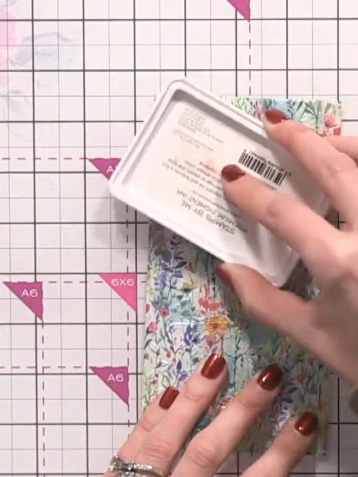 Step 3: Ink up both sides of the embossing folder using a distress oxide ink pad in your chosen colour, such as faded 
