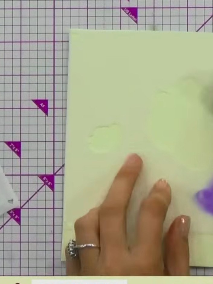 Step 2: Select stencil number one from your layering stencil set. Position it on your pale green card blank, aligning 