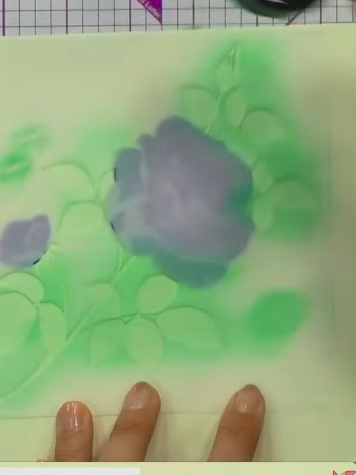 Step 9: If desired, add metallic wax or paste to selected areas of the stencilled roses and leaves for gilded highligh