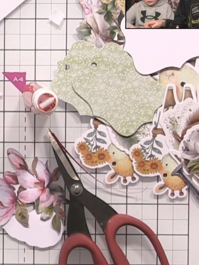 Step 8: Thread elastic or string through the hole at the top of the wallet and attach a decorative swing tag or label 