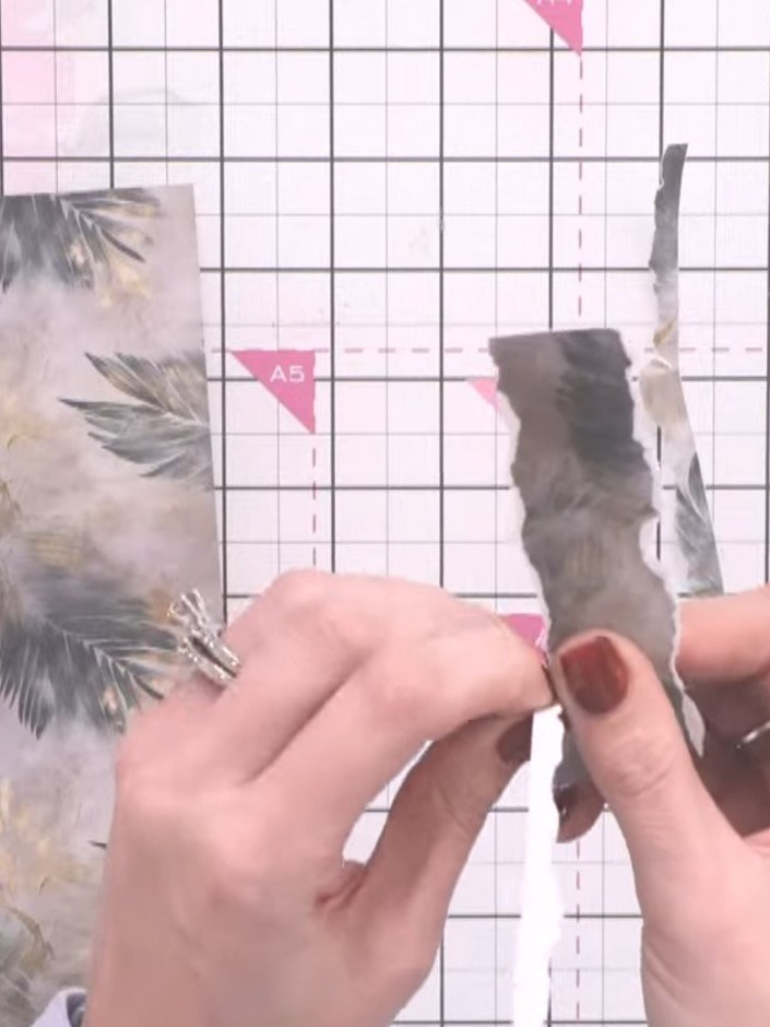 Step 1: Tear strips of leftover patterned paper and white paper to create organic, rough edges. Pull the paper forward