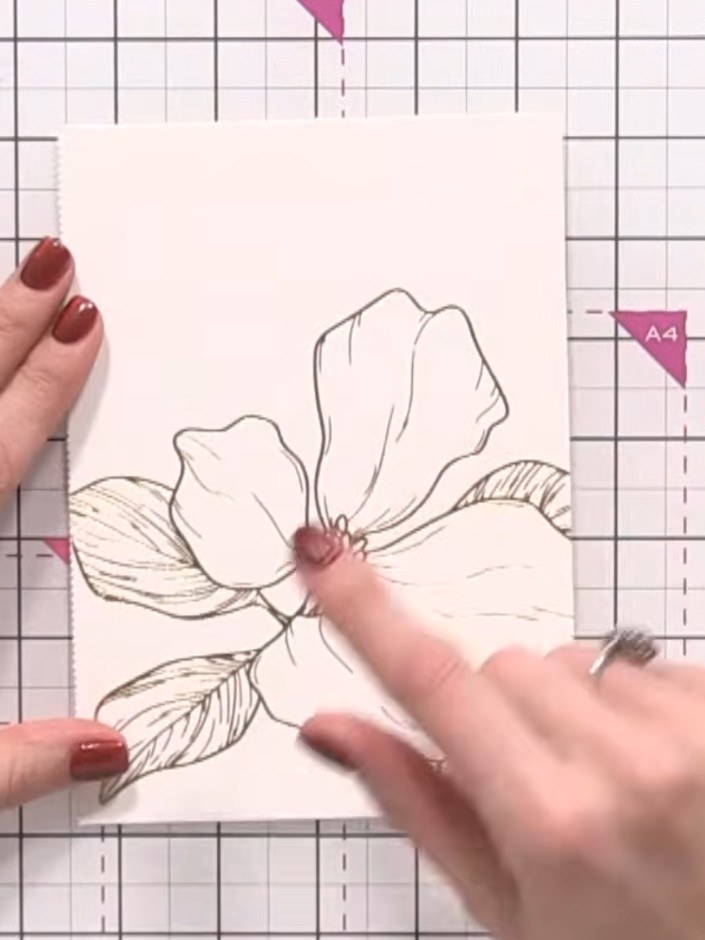 Step 1: Select a hot foil botanical design from the colouring book. Use a guillotine or trimmer to carefully cut along