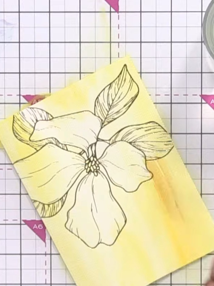 Step 4: Continue building depth in the yellow background wash by adding darker yellow tones. Introduce coffee-coloured