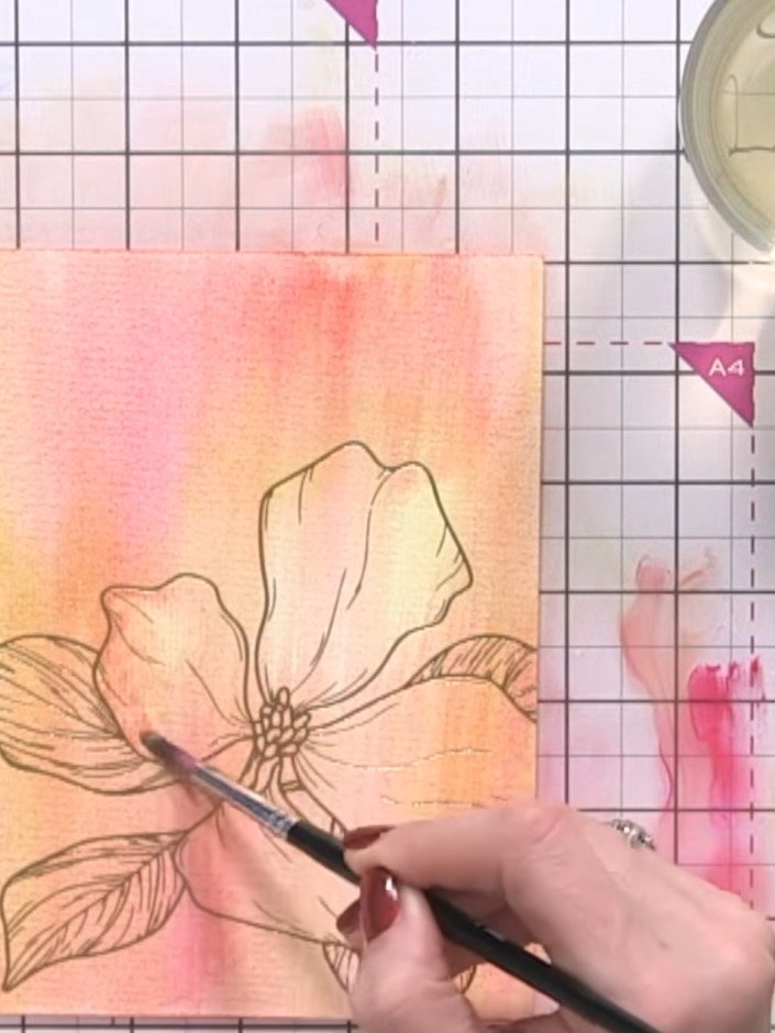Step 5: Using a clean, wet brush, paint water inside individual petals. Gently dab with tissue to lift out colour, cre