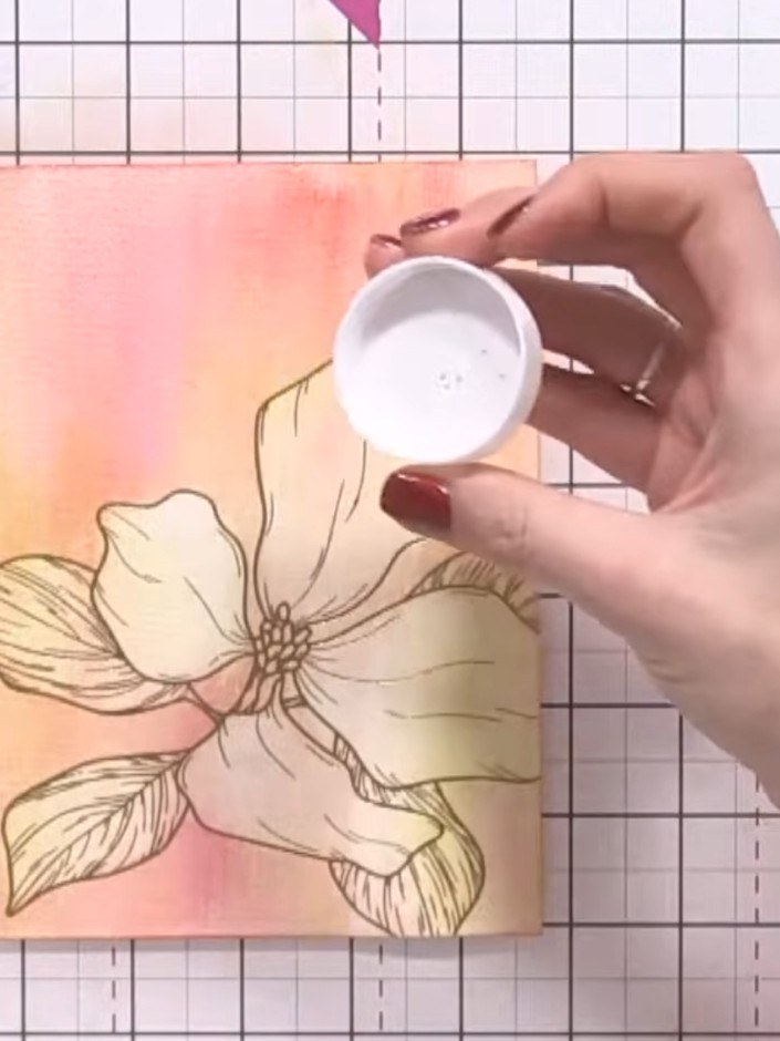 Step 6: Using a white lid or circular object as a template, lightly draw circles around the flowers with a watercolour