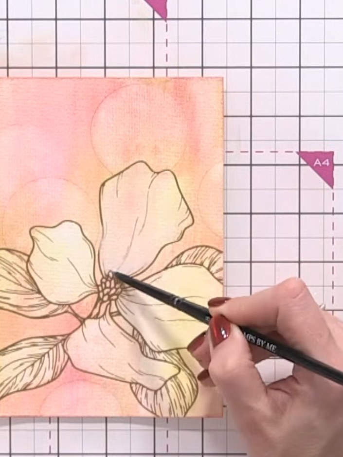 Step 9: Mix white watercolour paint to create a pale grey tone. Paint over all the flower petal areas with this grey w