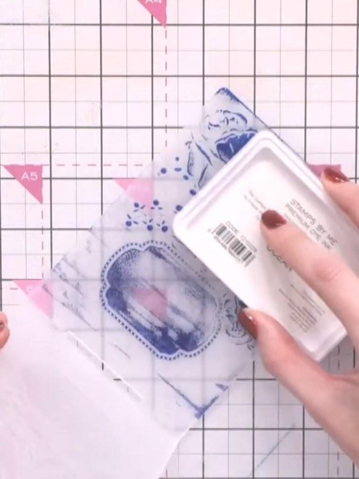 Step 9: Use the white ink pad to tap over the raised embossed details on the card. This will highlight the design and 