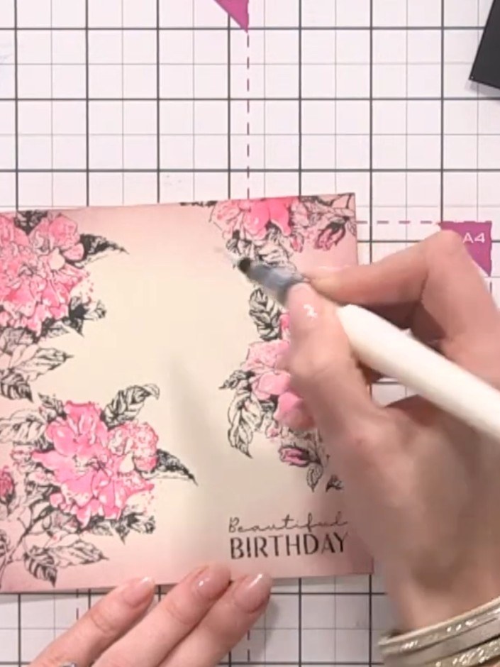Step 10: Add sparkle to selected leaves using a sparkle pen for subtle embellishment. Focus on the grey and black leave
