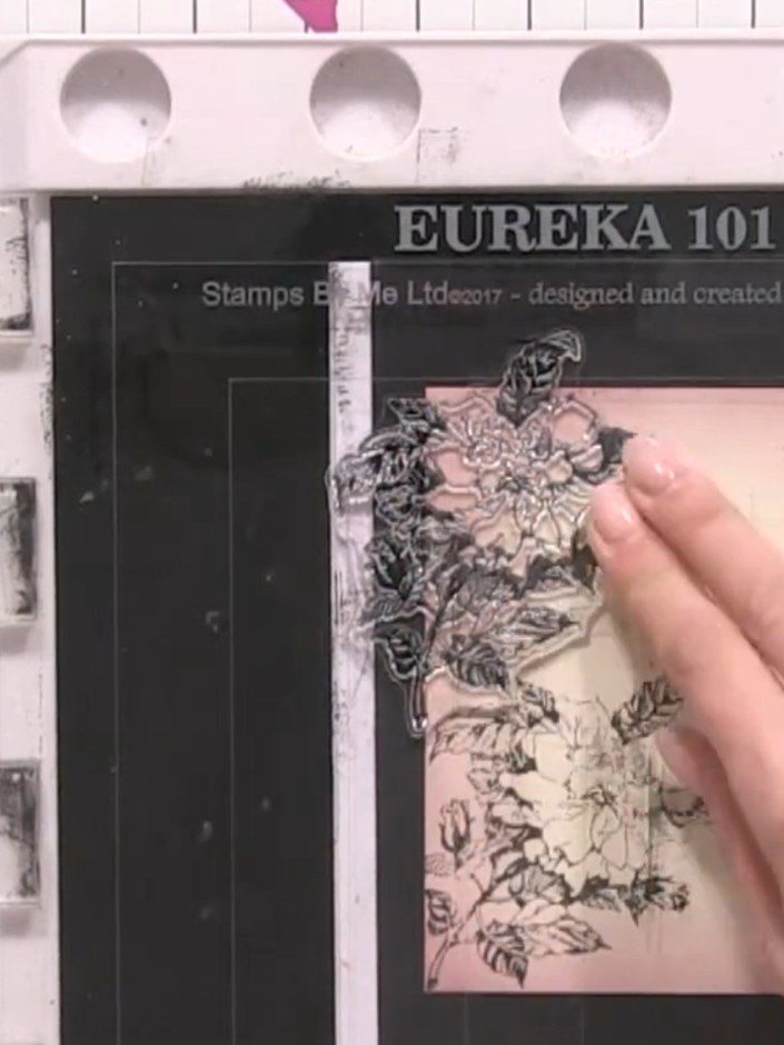 Step 5: Stamp the side bud element from the A5 Lamination stamp set in black ink onto the pink panel, positioning it t