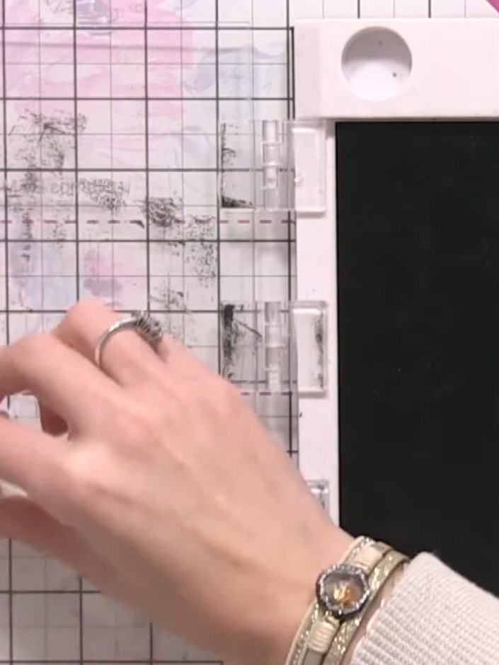 Step 6: Lightly tap the stamp onto a small ink pad to load it with minimal ink. Use a tissue to remove any excess ink 