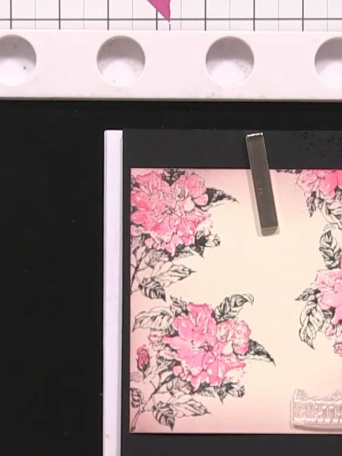 Step 9: Stamp the 'Beautiful Birthday' sentiment in black ink at the bottom right of the floral panel. Ensure the ink 