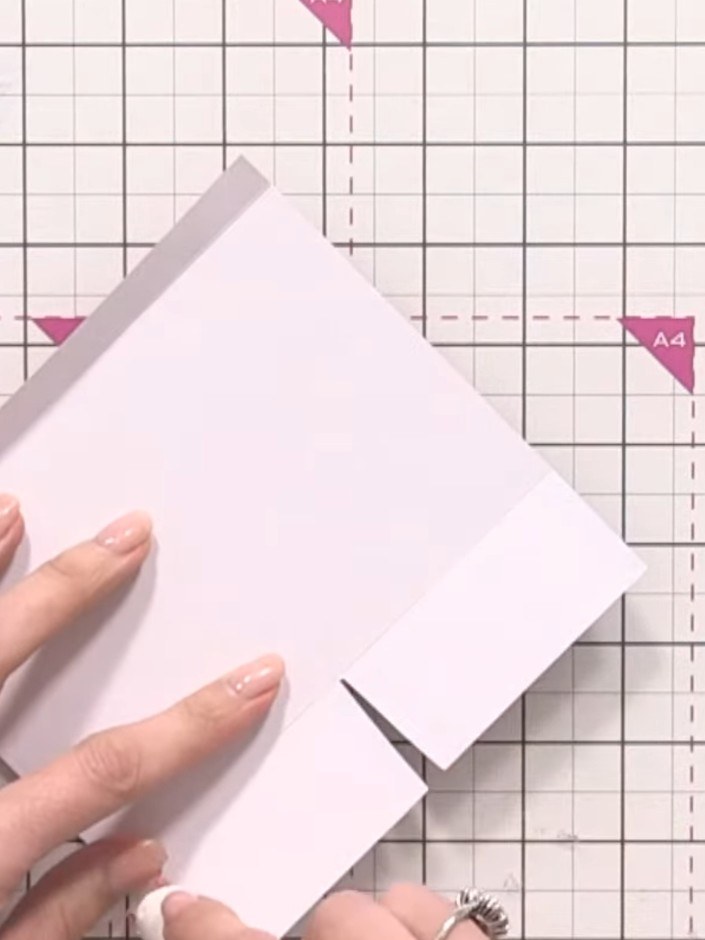 Step 8: Apply glue or tape along the side edges of the pocket to seal it closed. Press firmly to ensure a secure bond.