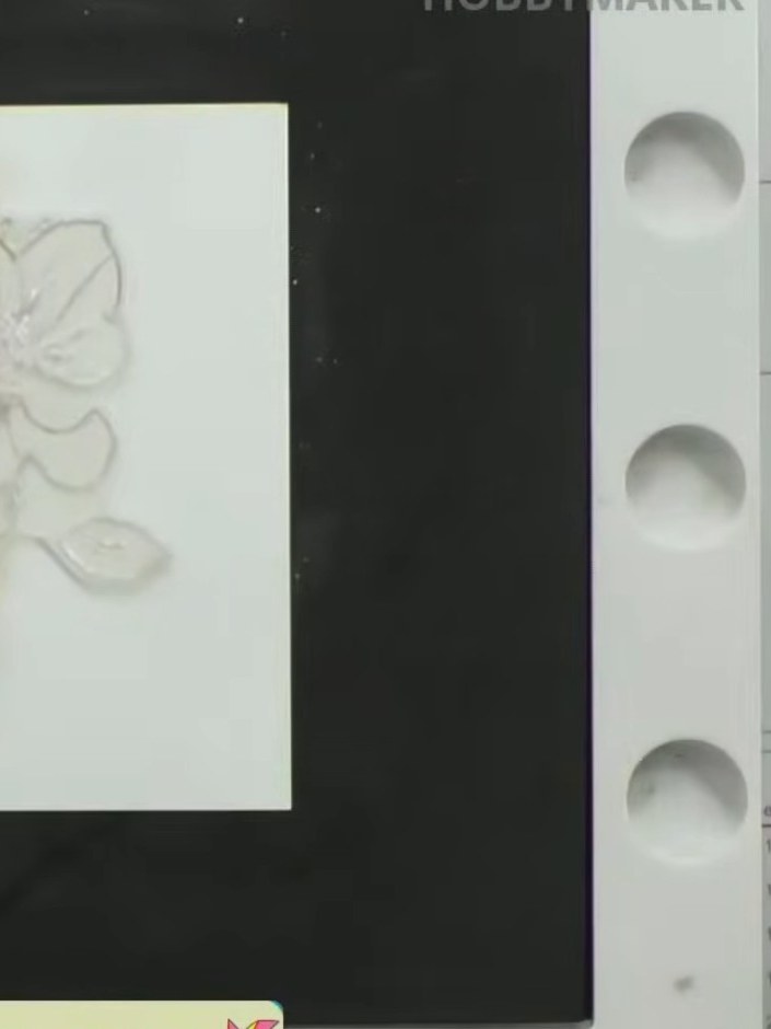 Step 1: Select the solid portion of the clear lamination stamp showing the face outline. This is the part that will be