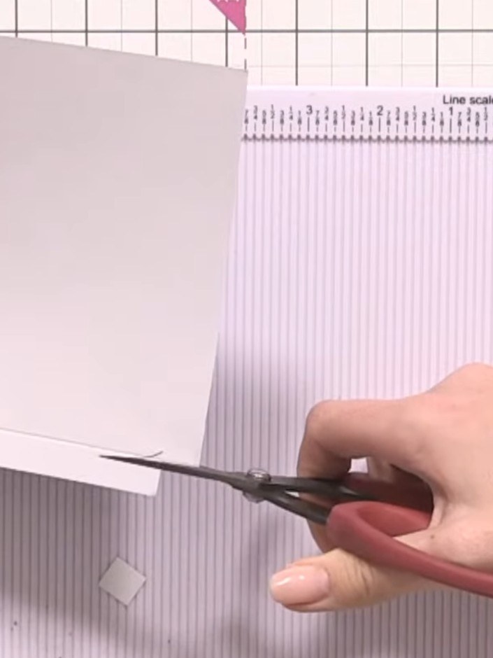 Step 5: Score along the fold line firmly using a scoring tool to create a crisp, clean edge for your fold-out page.