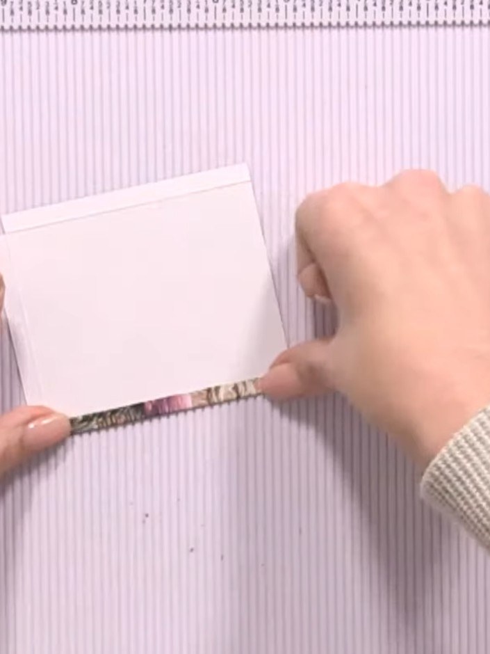 Step 5: Trim away any excess bulk from the folded corners using angled cuts to reduce thickness and create neat corner