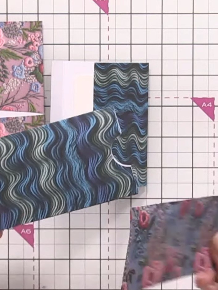 Step 3: Cut a strip of the floral patterned paper slightly shorter than the height of your pocket piece. This will be 