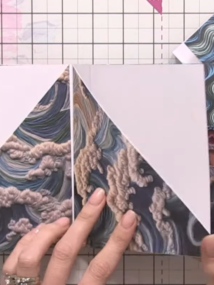 Step 5: Use offcut paper to create small pockets by scoring quarter-inch lines along the edges. Fold along the score l