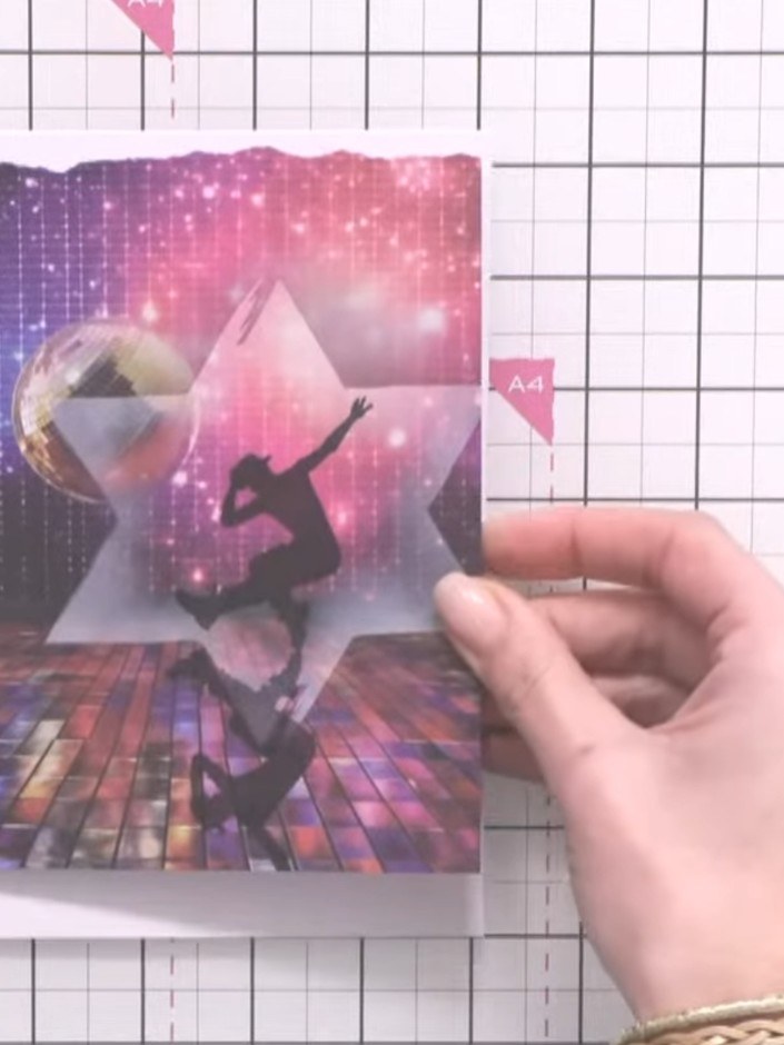 Step 11: Mount the torn panel onto a pink card blank using double-sided tape, positioning it centrally on the card fron