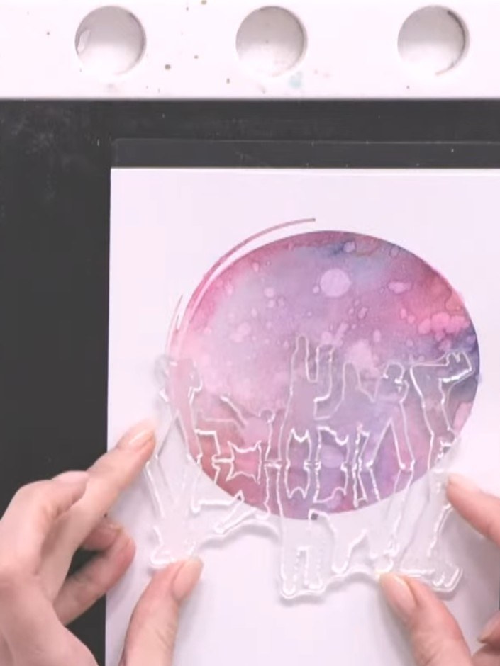 Step 10: Ink up the full dance crew stamp with black ink using your ink pad.