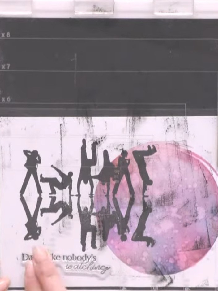Step 12: Add a sentiment from the stamp set, positioning it below the dance crew silhouettes to complement the design. 