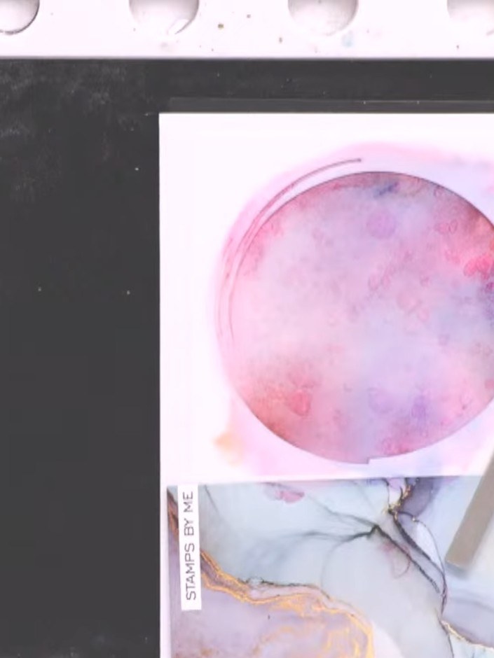 Step 8: Use a tissue to dab up excess water from the stamped image. This will lift some of the ink to create texture a