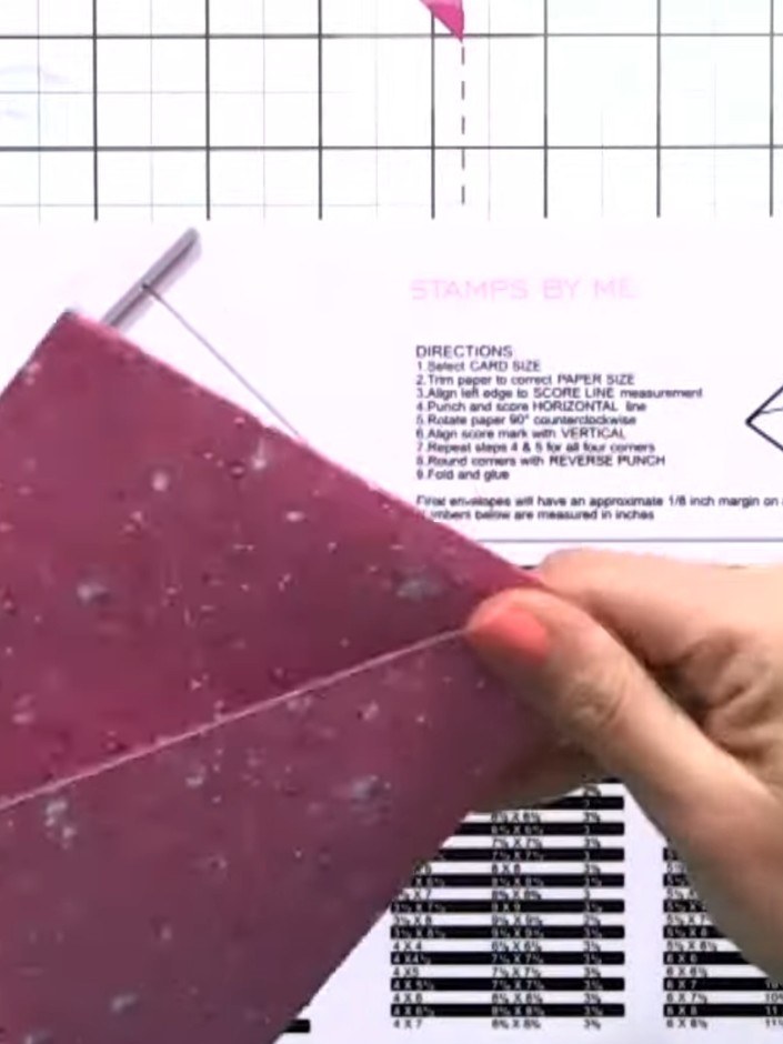 Step 10: Use the corner punch feature on the box maker tool to round the corners of the envelope flap. Position each co