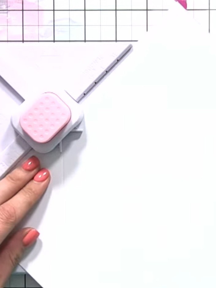 Step 5: Twist the box maker tool and line the paper back up with the first score line to create the next fold.