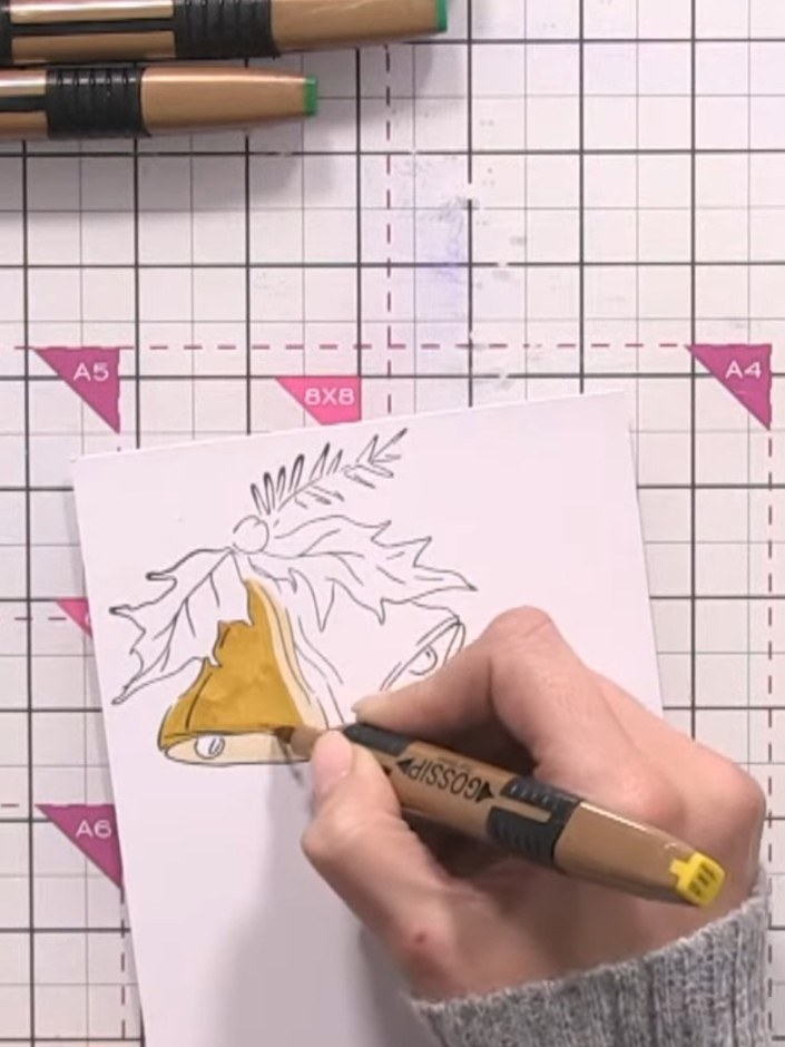 Step 4: Using the medium yellow marker, colour approximately three-quarters of the bell. Leave one side lighter to sho