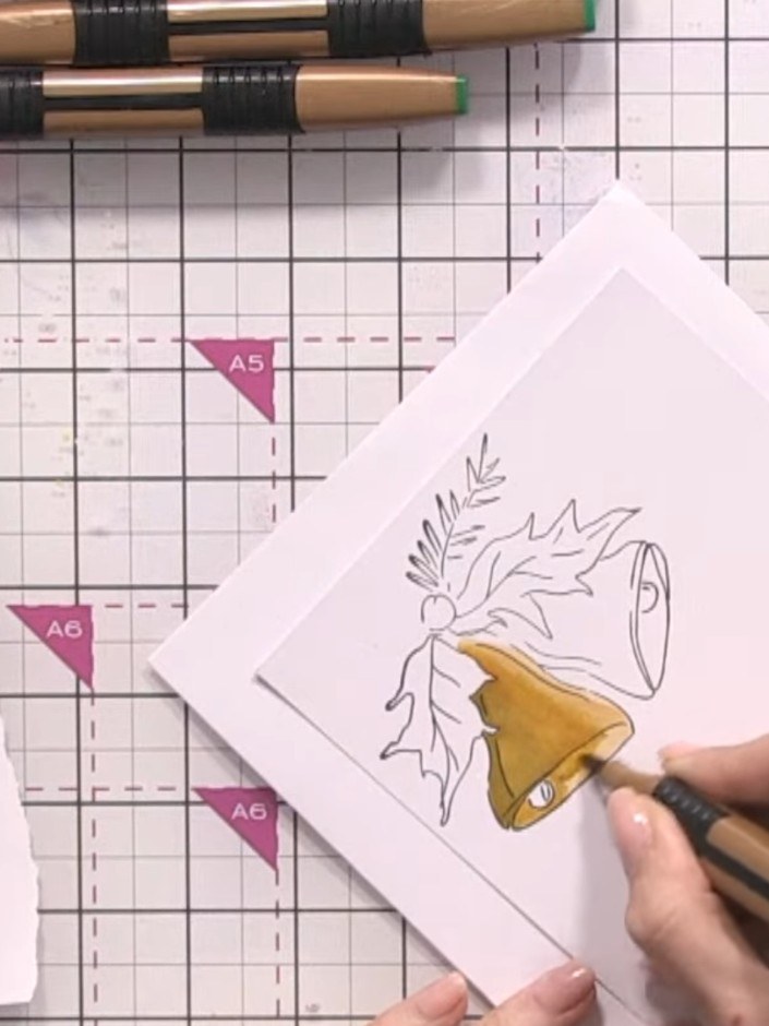 Step 7: Using the same three-shade technique, colour the second bell. Keep the light source consistent, placing the hi