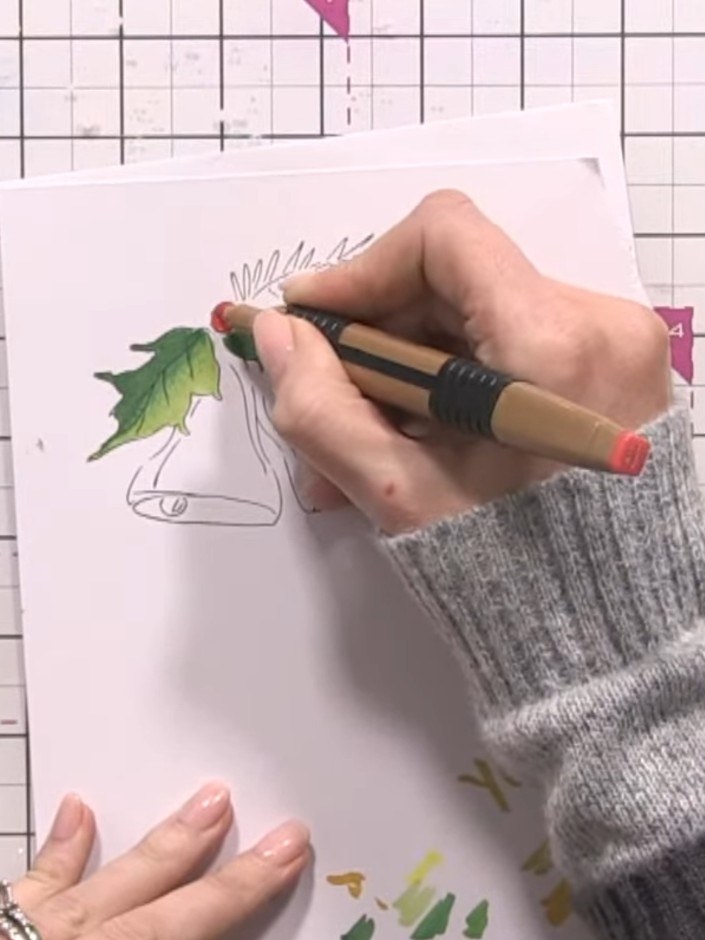 Step 9: Colour a small red berry with light red marker. Add dark red shading to create depth, then blend the colours t