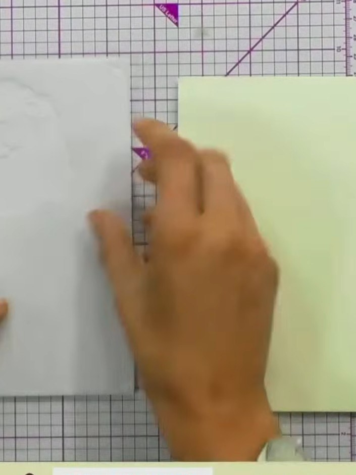 Step 1: Position the first numbered stencil (marked '1') on your pale green card stock, aligning it with the edge of t