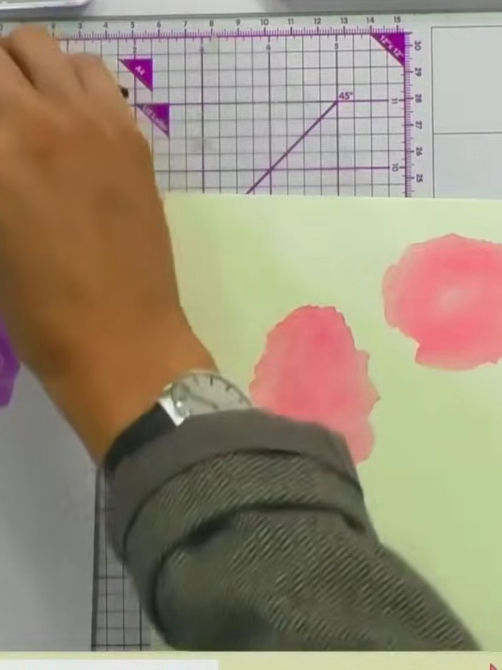 Step 7: Using the final stencil layer, apply your darkest purple ink to the hydrangea to create shadow and definition.