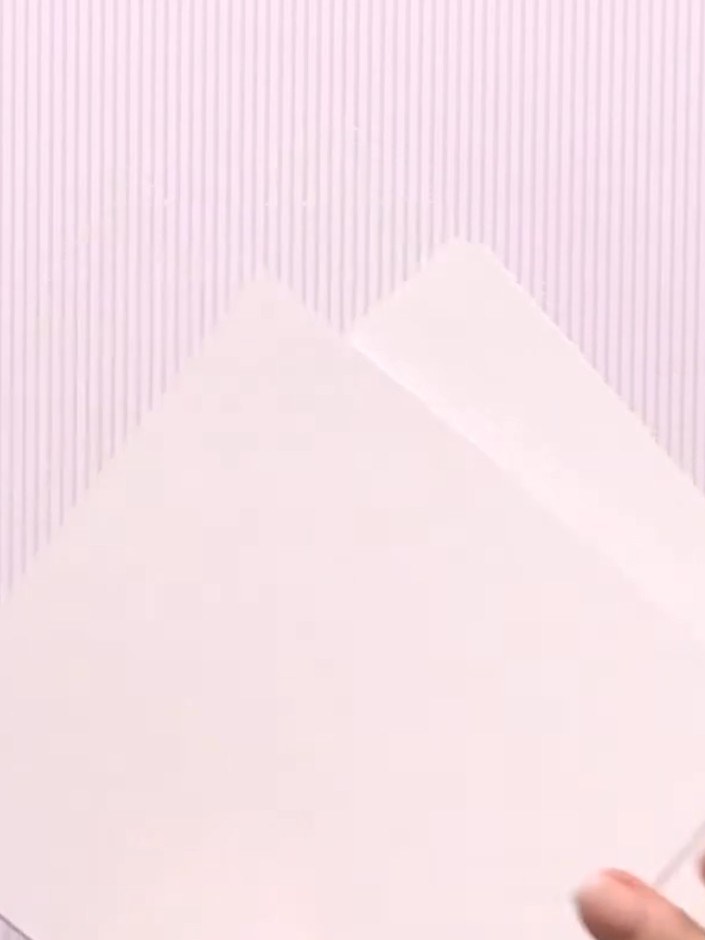 Step 1: Select five sheets from your 6x6 paper pad. Choose designs you like for the front cover and interior pages.