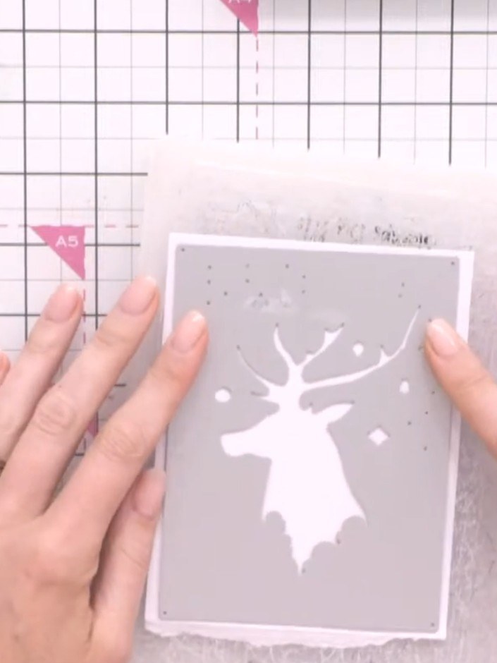 Step 1: Cut the stag die from white cardstock using your die-cutting machine. The stag measures approximately 5½ x 4 i