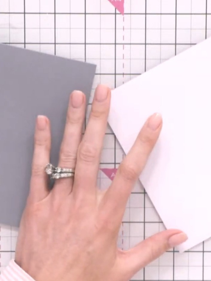 Step 4: Adhere the patterned paper panel to your grey card blank, positioning it to leave a clean border down one side