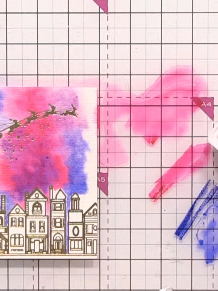 Step 6: Soften any harsh colour edges on the watercolour background by gently blending with a damp brush or your finge