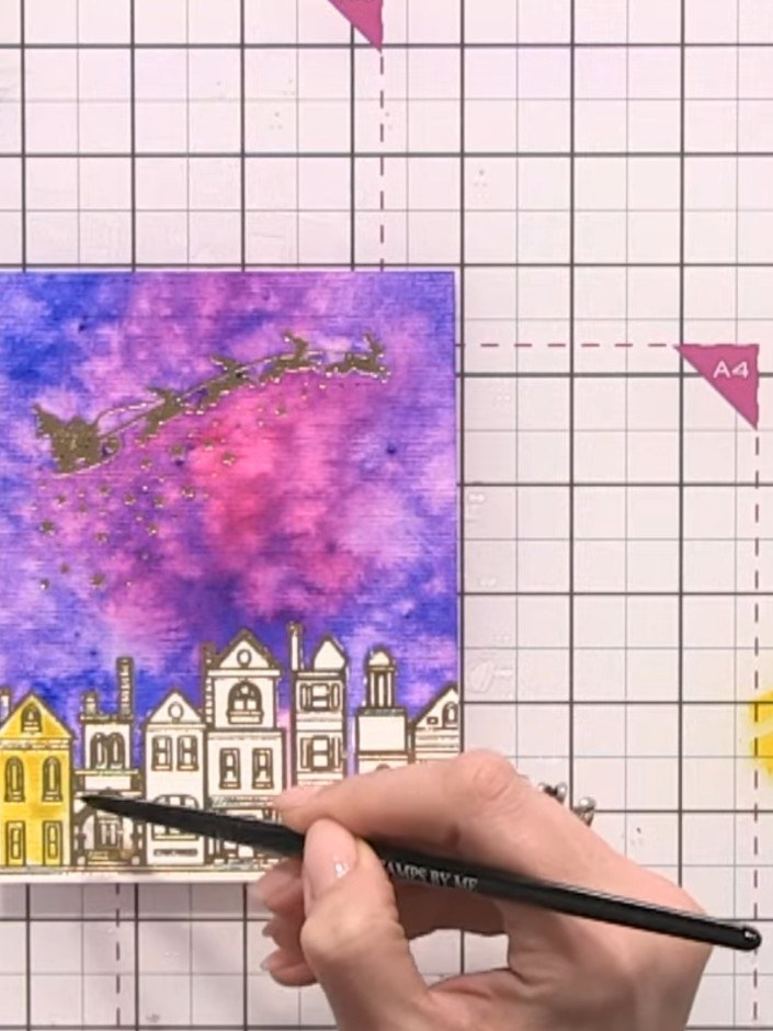 Step 7: Using yellow watercolour, paint all the house buildings. Work from top to bottom, ensuring the blue sky is com