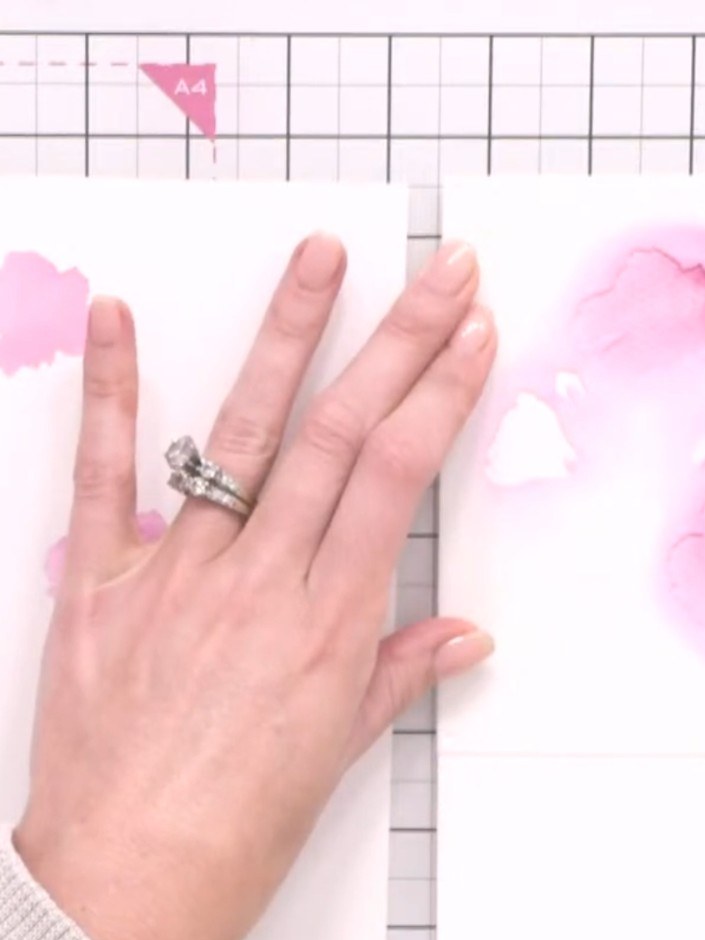 Step 5: Apply the Fandango pink colour through stencil one onto the textured side of the watercolour paper, building u